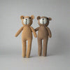 Crochet plush teddy bears placed against a white background