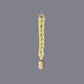 Yellow macrame wall hanging with a swiss bell 