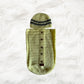 Yellow button down Crochet baby cocoon with a baby beanie placed on a white fur fabric